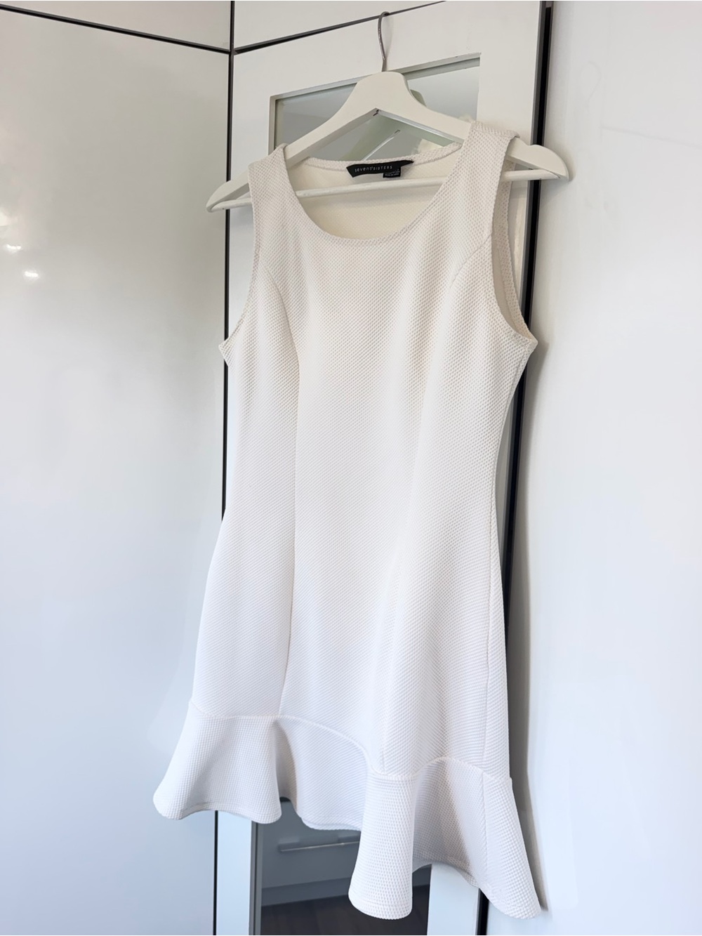 White Sleeveless Flounce Hem Dress